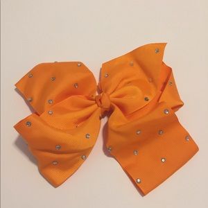 New orange rhinestone bow